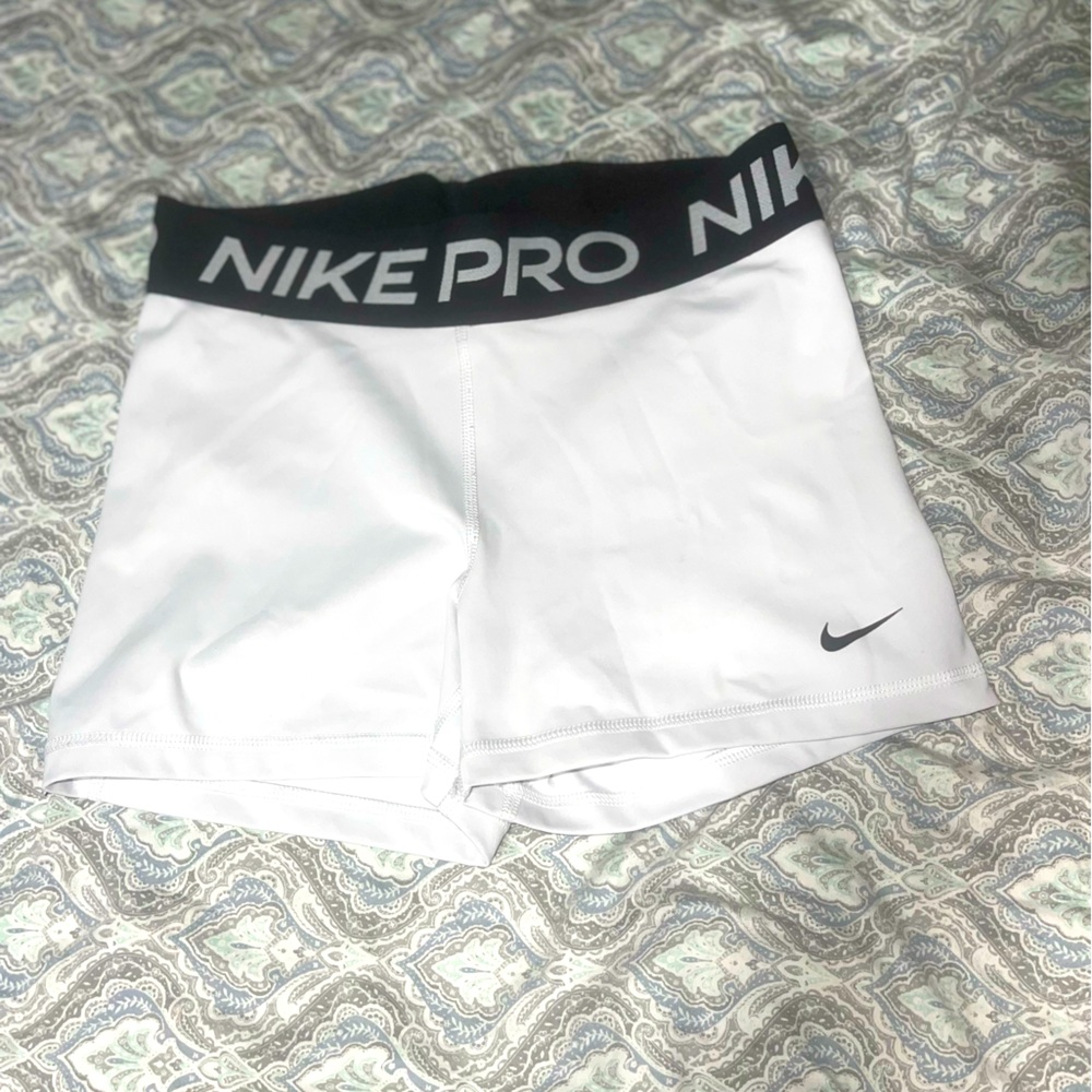 White Nike pro shorts